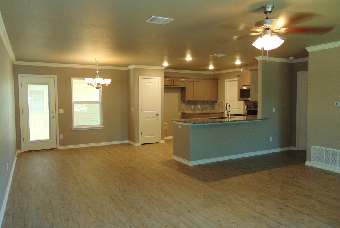 Spacious open-plan kitchen and living room.