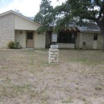 House number 1103, stone facade.