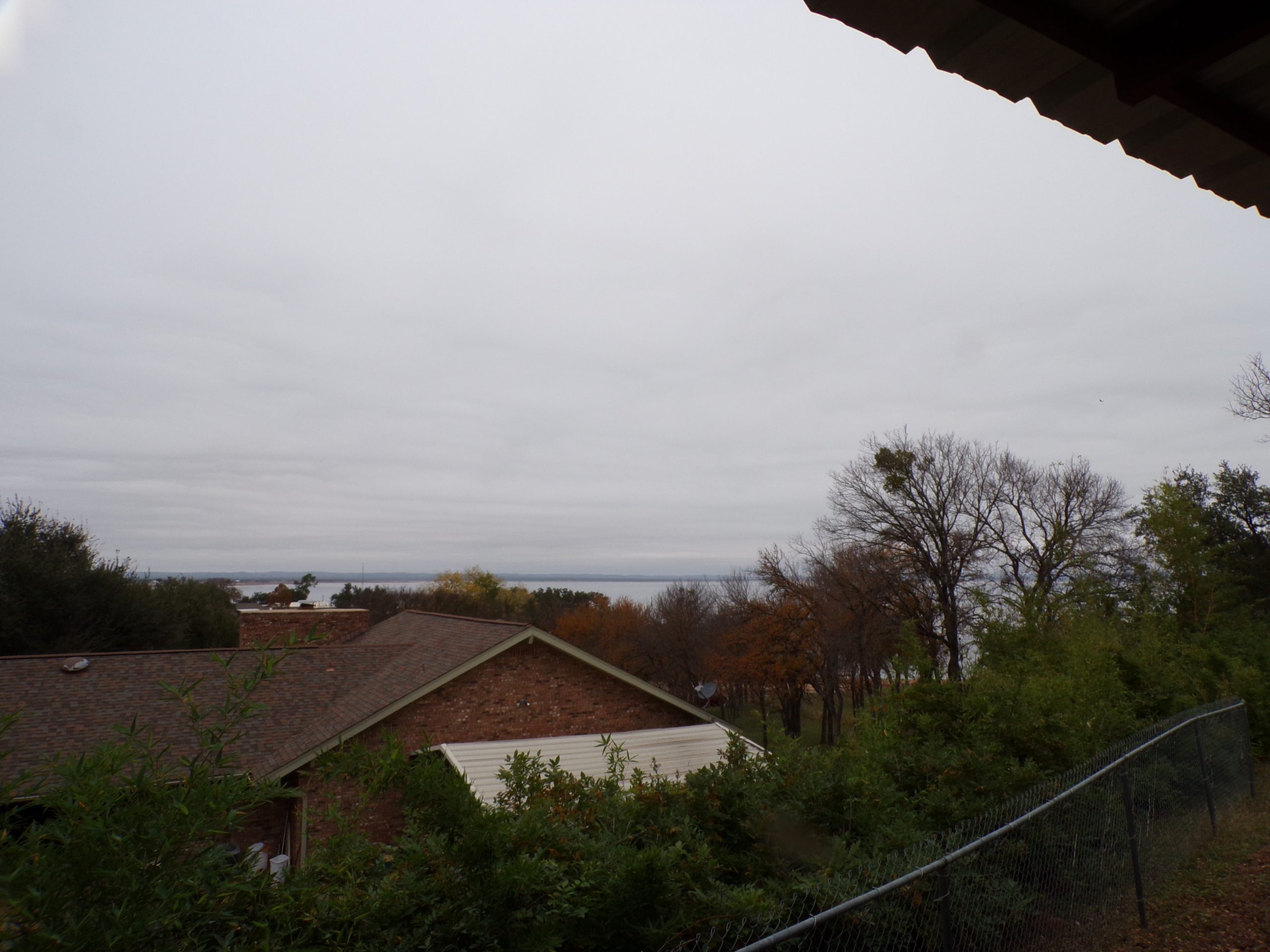 Overlooking lake from brick house.
