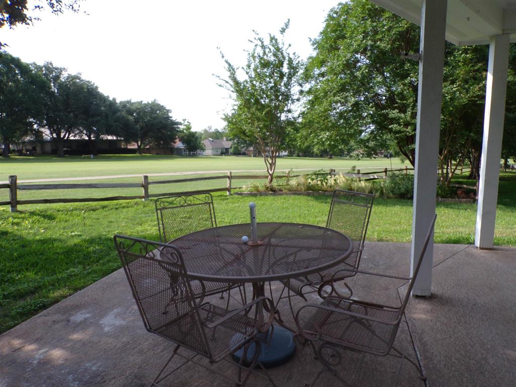 Patio table overlooking golf course.